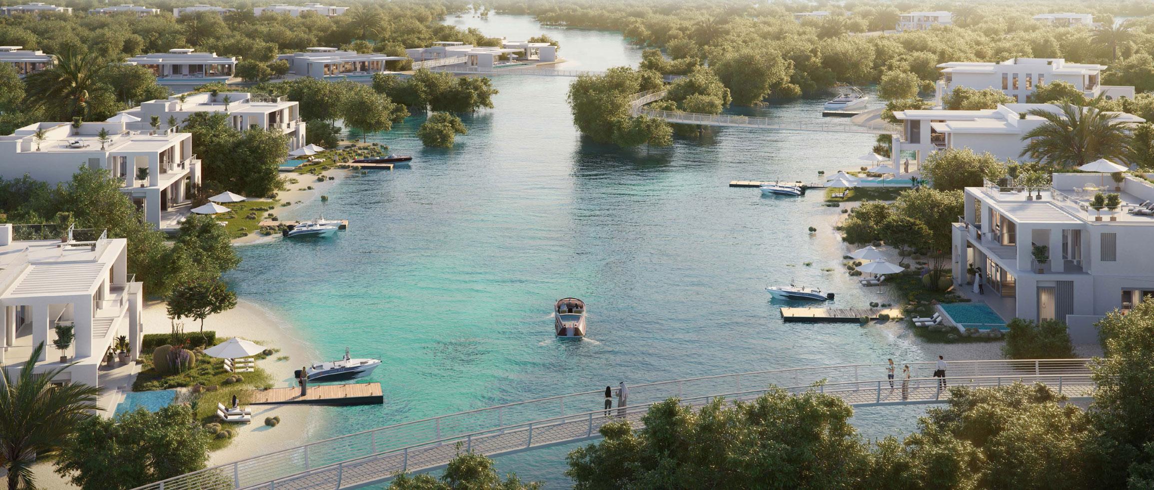 Elegant bedroom interior at Ramhan Villas with floor-to-ceiling windows and serene waterfront outlook.