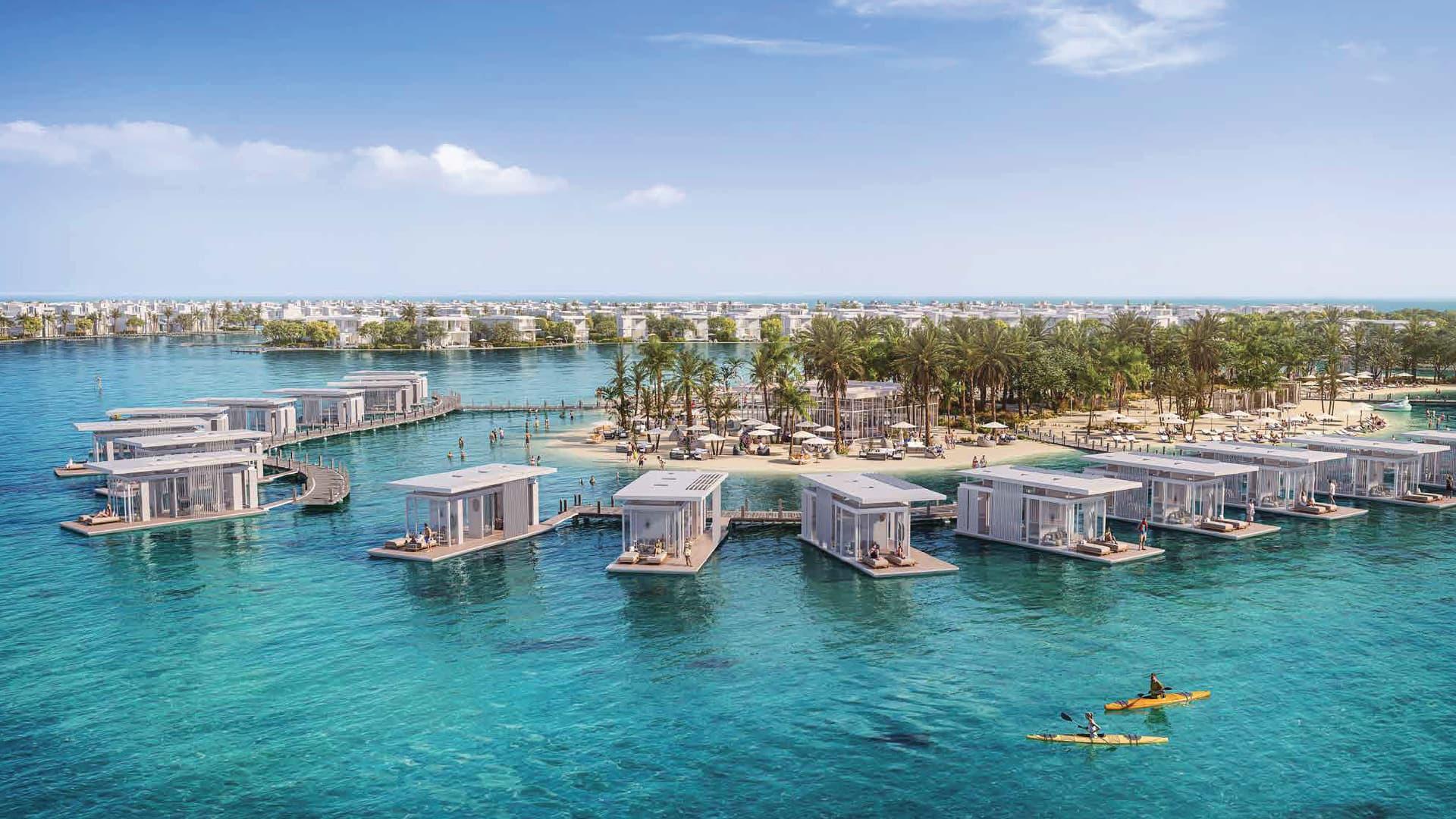 Aerial view of Ramhan Villas Abu Dhabi waterfront community with luxury villas, marina, and private beaches.